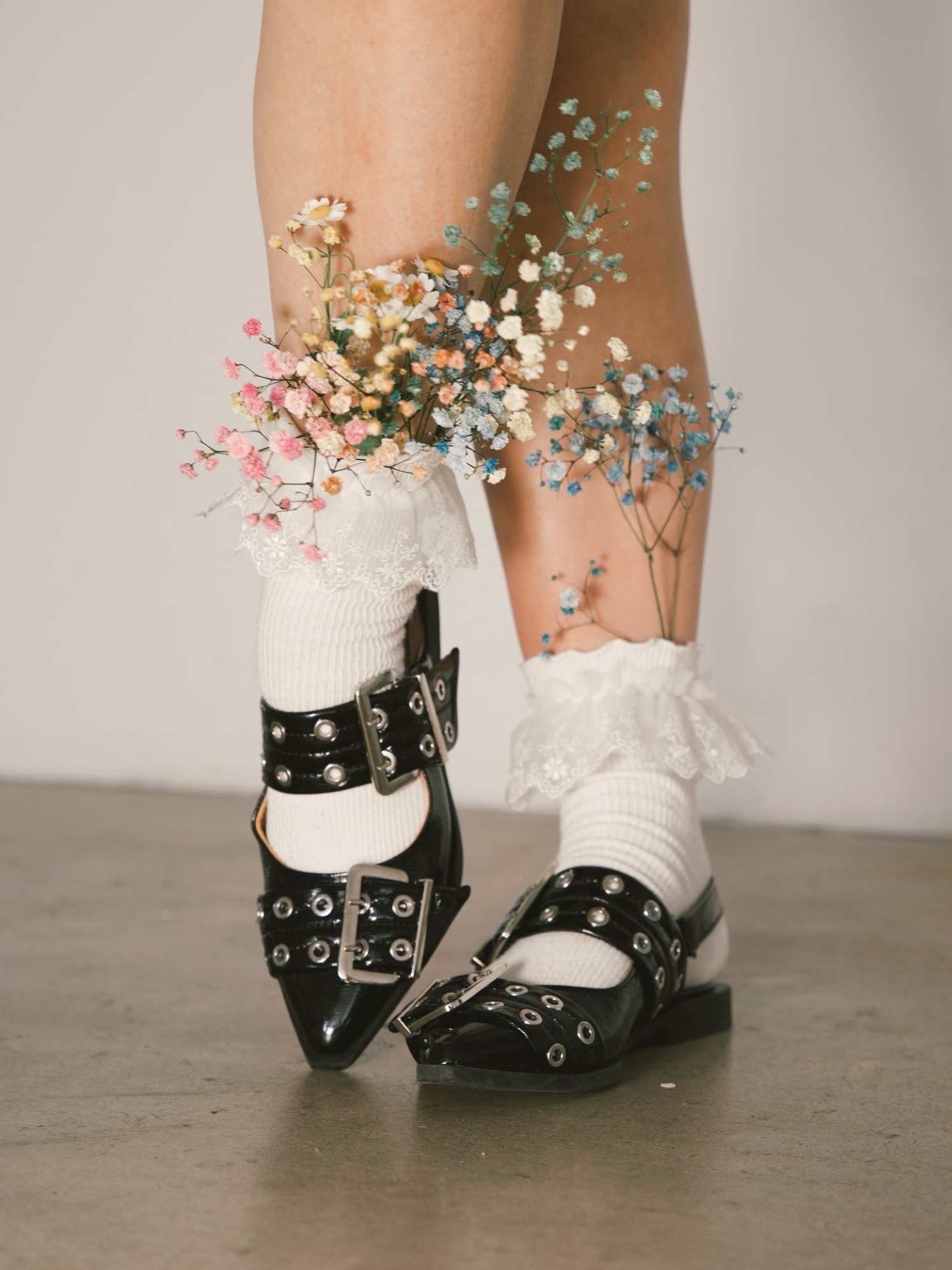 Buckled mary janes and flower-trimmed socks