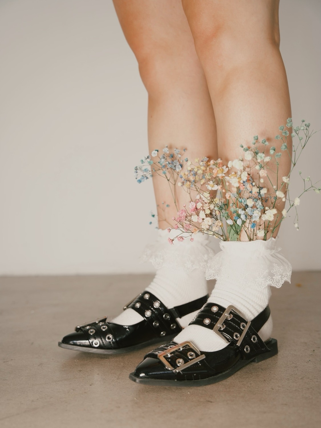 Flower-trimmed socks and buckled mary janes